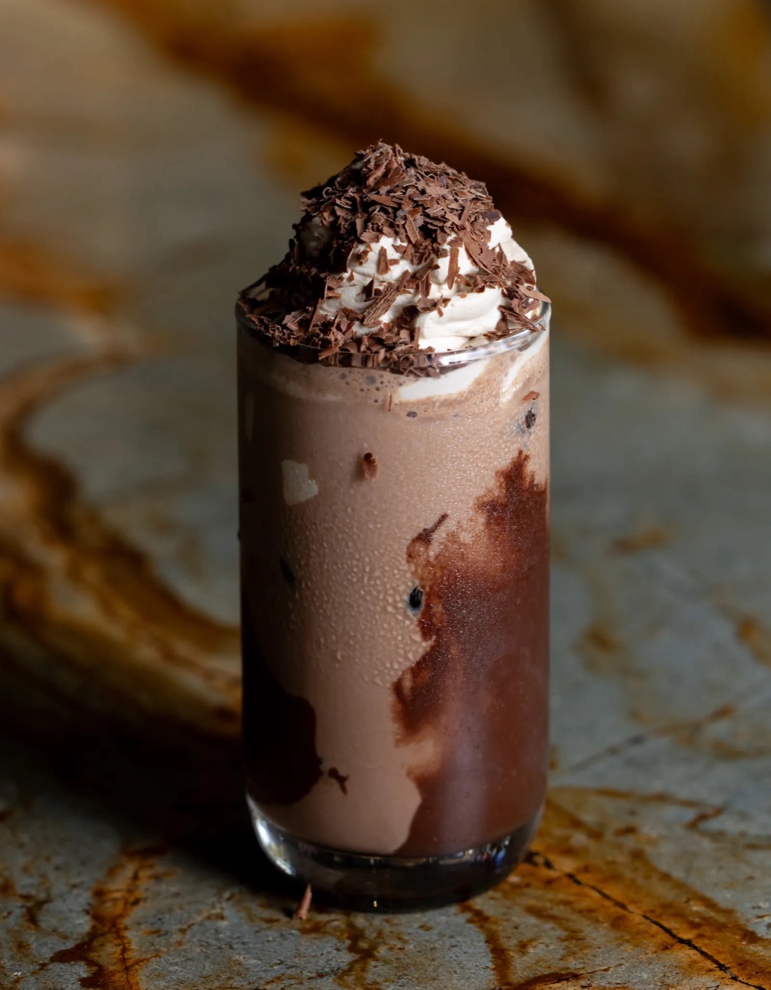 Iced chocolate topped with whipped cream
